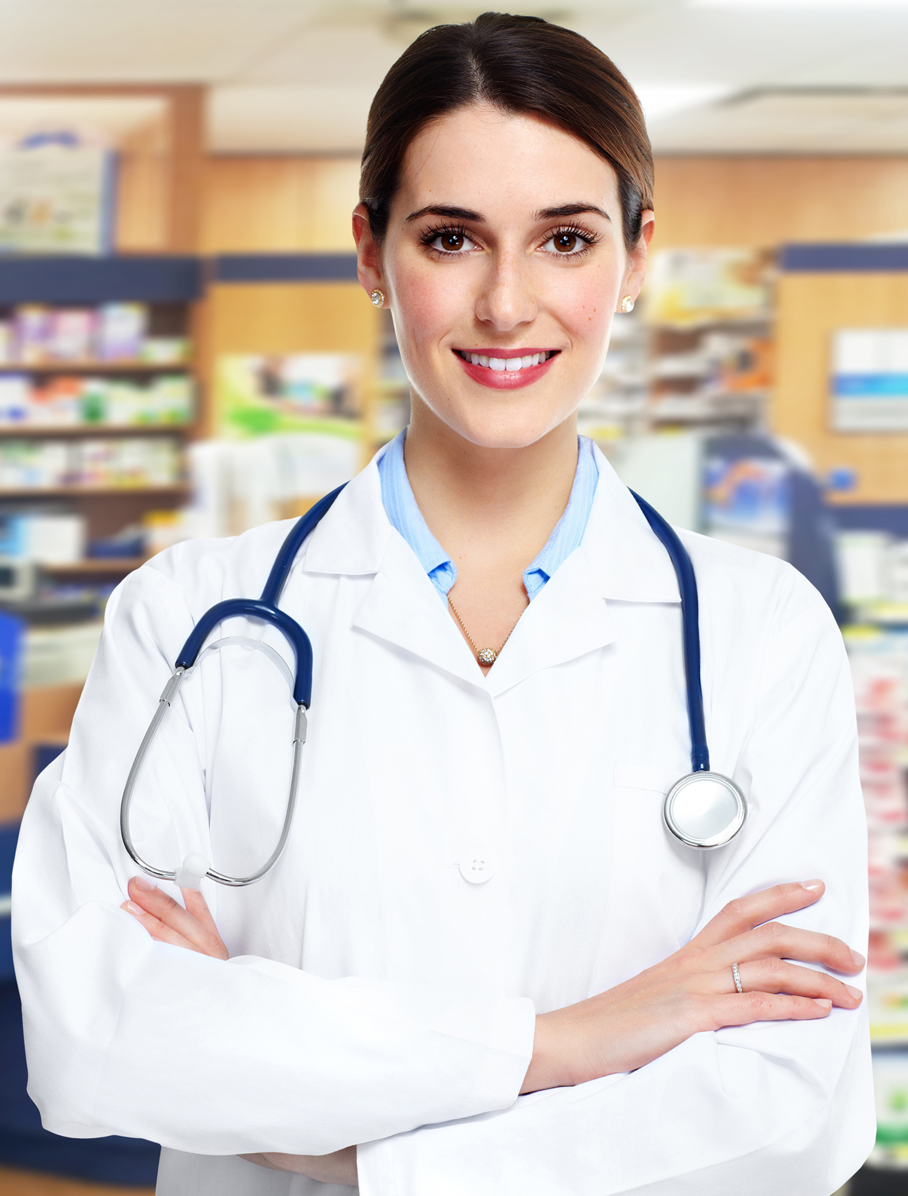 Medical physician doctor  woman over pharmacy background.